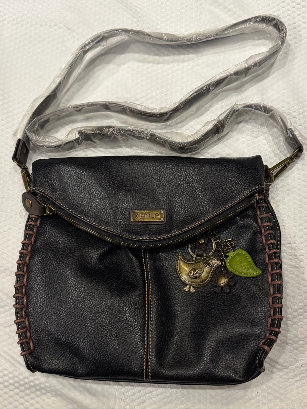 Chala Handbags NWT Black Pebbled Faux Leather Crossbody Flap Bag Bird Charm Boho